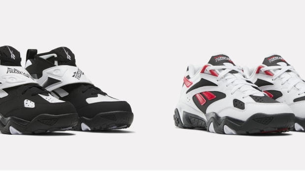 Emmitt Smith's black, white, and Reebok sneakers.